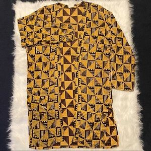 Oversized small black and gold shrug.